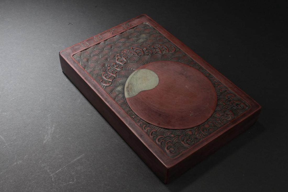 A Red Chinese Waved-style Inkstone Display (1 of 3)