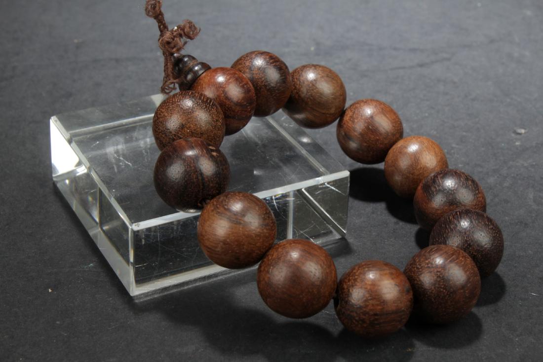 An Estate Chinese Wooden Bead Bracelet (1 of 3)