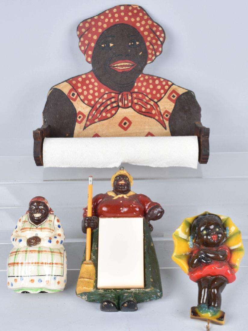4-VINTAGE BLACK AMERICANA ITEMS: Nice lot with painted wood 12" mammy towel holder, a 10" composition mammy pencil and pad holder, a 6 1/2" ceramic mammy string holder, and a 8" plaster girl with umbrella. Condition varies. The compo