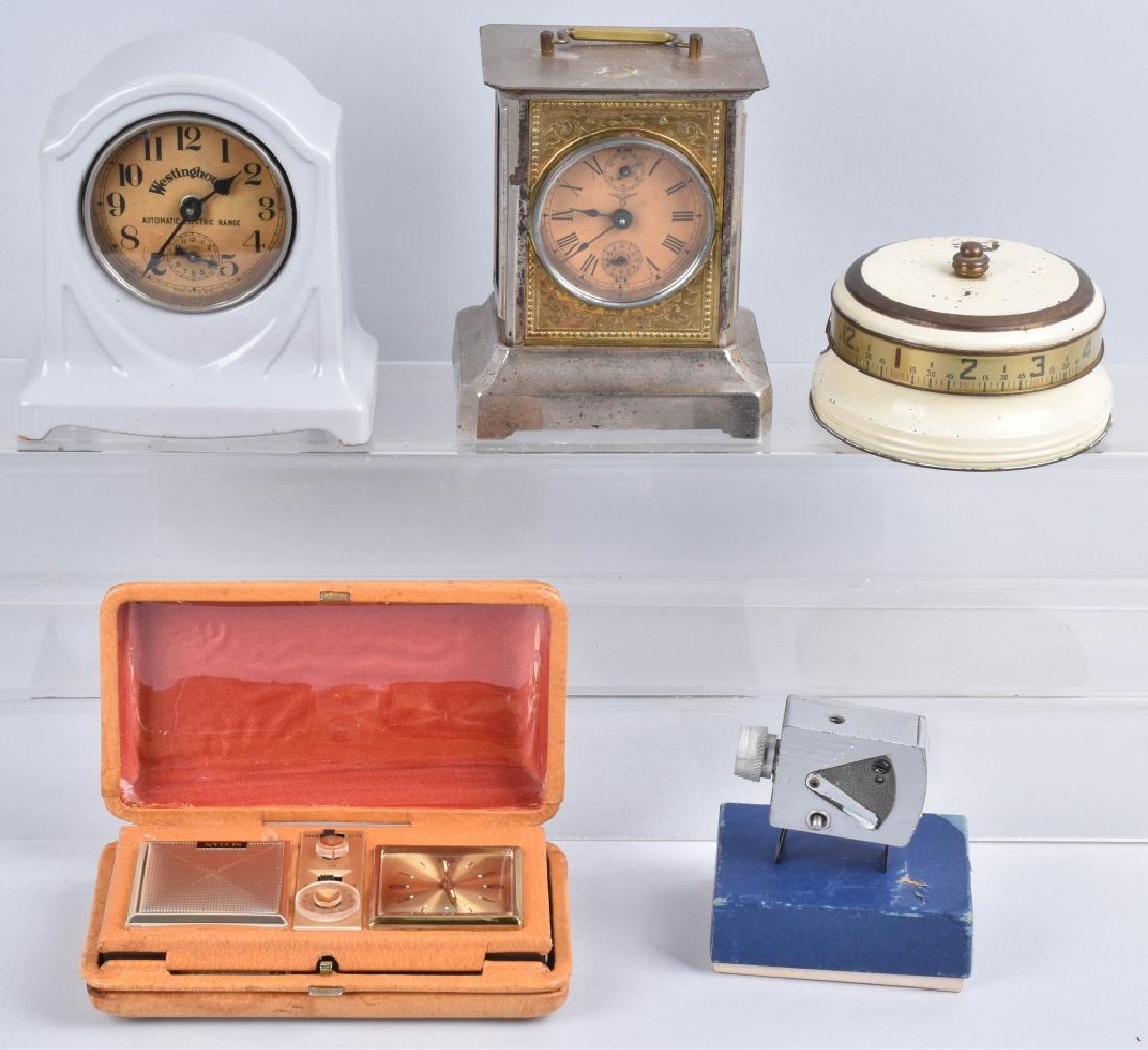 LOT of CLOCKS, TRAVEL RADIO CLOCK, & 16MM CAMERA (1 of 6)