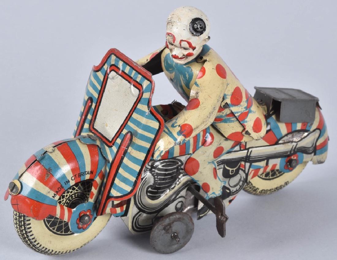 BRITAIN Tin Windup 1st PRIZE CLOWN ON MOTORCYCLE (1 of 5)