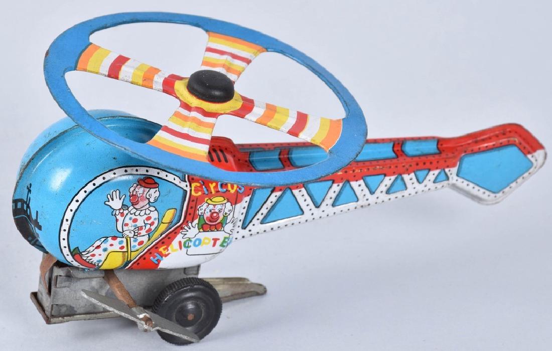 JAPAN Tin Windup CIRCUS CLOWN HELICOPTER (1 of 4)