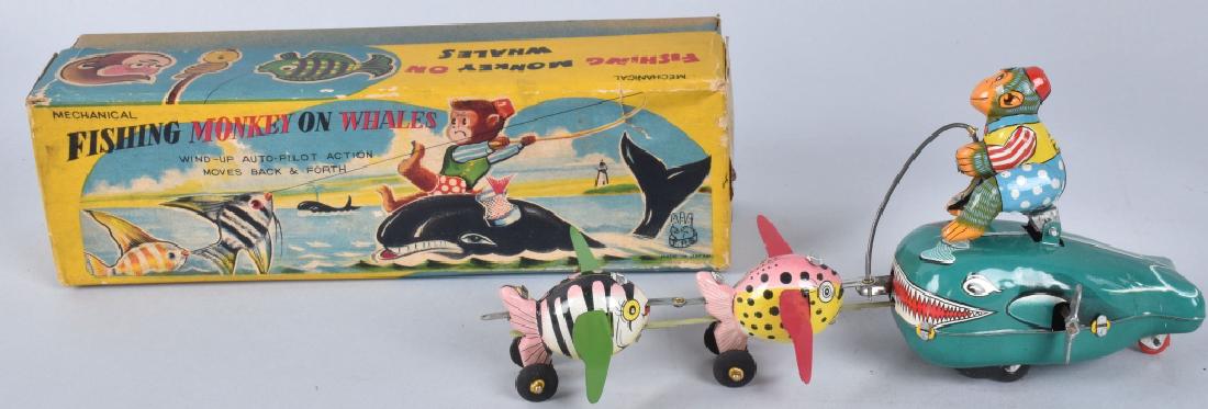 TPS Tin Windup FISHING MONKEY ON WHALE w/ BOX: Excellent tin windup Fishing Monkey On Whale. All original with great colors. Works. With Box. 9" Excellent