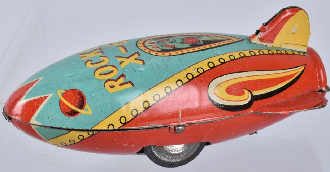 JAPAN Tin Friction ROCKET X-6: Nice tin friction Rocket X-6. Great early colors. Works. 4" Excellent