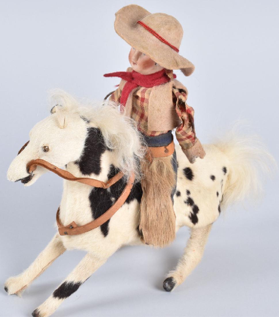EARLY BISQUE HEAD COWBOY on CLOCKWORK HORSE (1 of 6)