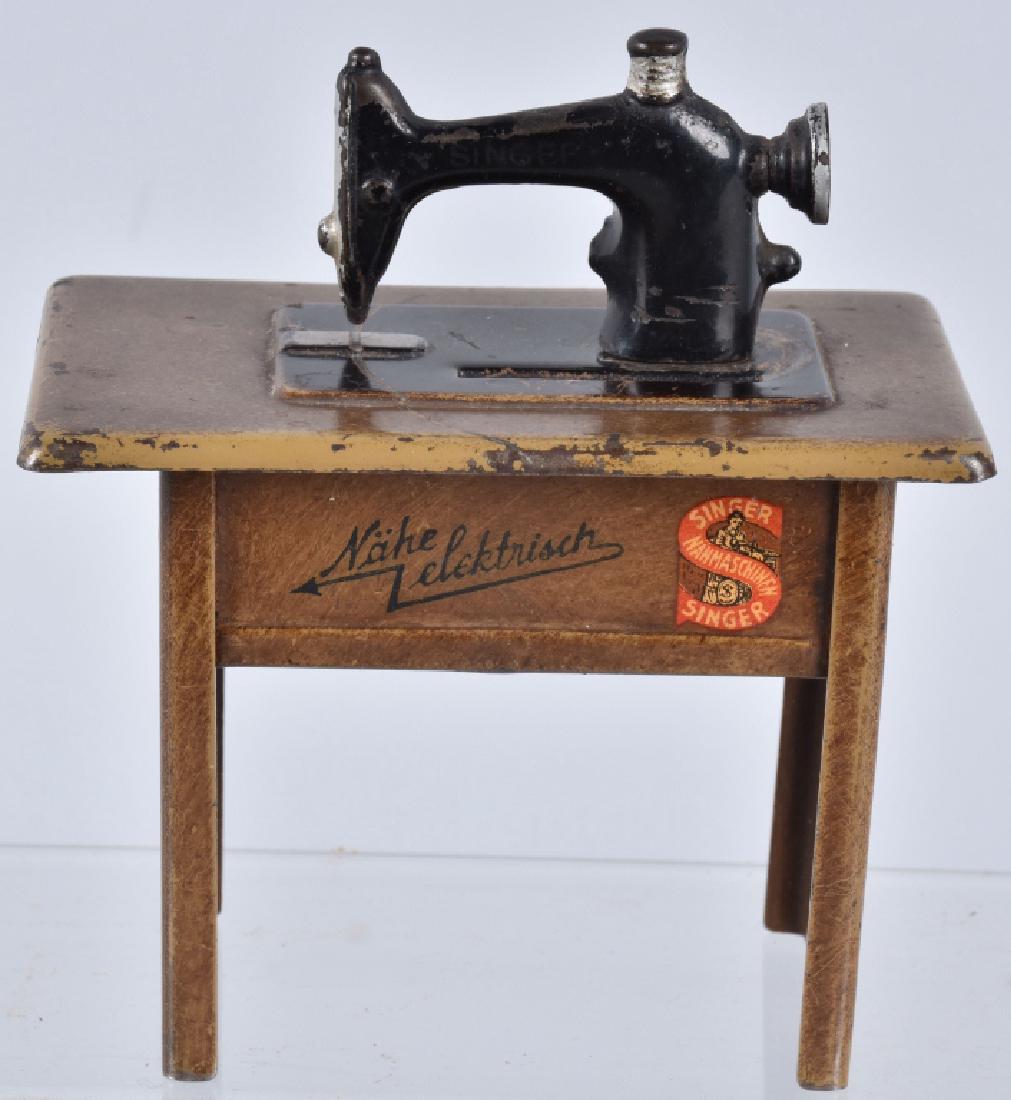 GERMAN TIN and DIECAST SINGER SEWING MACHINE BANK (1 of 6)