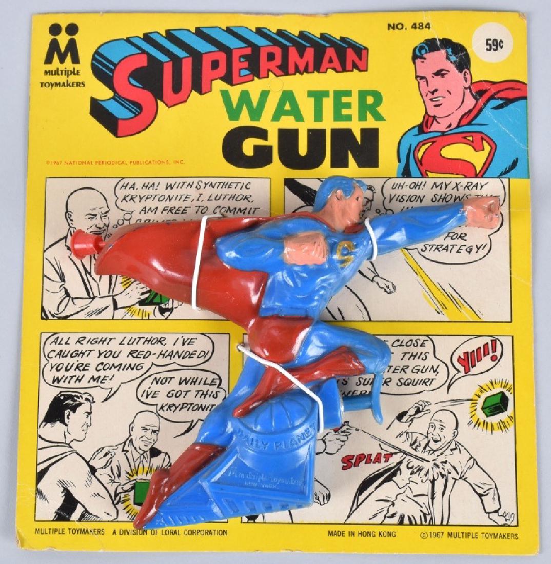 1967 MULTIPLE SUPERMAN WATER GUN MOC: Scarce 1967 Multiple Toy Makers Superman Water Gun. Mint still sealed on card. 8" Excellent