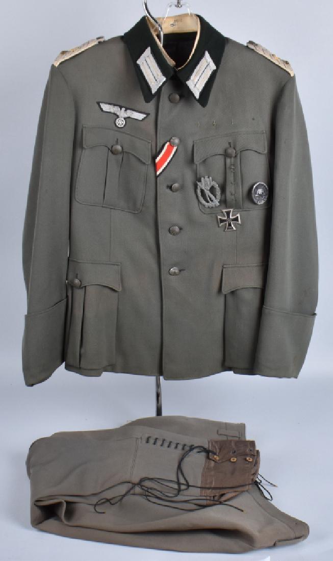 WW2 GERMAN M36 INFANTRY OFFICER UNIFORM: Great example of a WW2 M36 Infantry Officers tunic and breeches. Tunic features a 5 button front with a double hook & catch neck closure. Tunic is fully lined with an internal dagger hangar, and has n