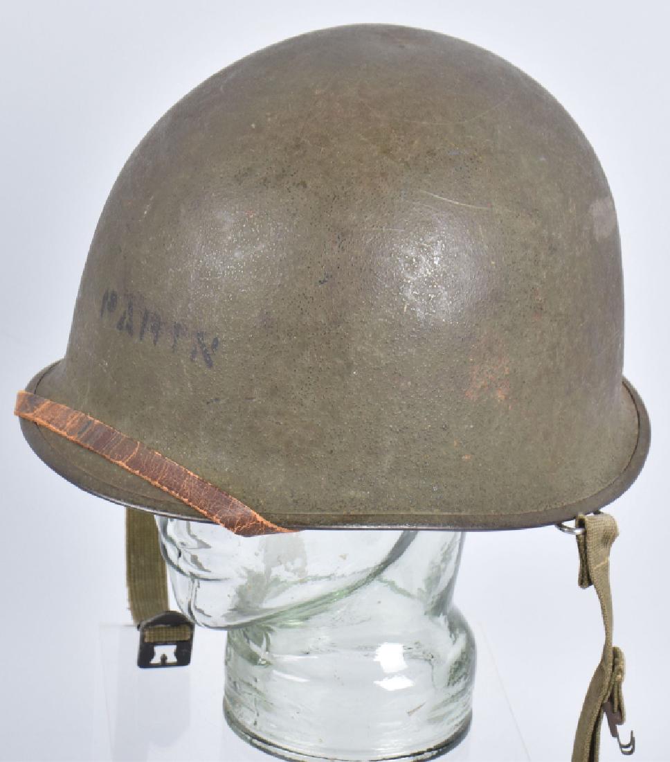 WW2 ID'd US MARINE / NAVY M1 HELMET: Stenciled Parin on front with different name on Westinghouse liner. Production lot 475A. Swivel bales with rear seam. Rivets marked United Carr. Very Good