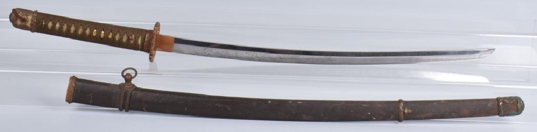 JAPANESE KATANA SWORD, OLD BLADE, WW2 MOUNTS: 28 1/2" overall, with 22 1/2" cutting and 1 1/8' wide at copper habaki. 2 hole tang is signed, signature is "Kanesada". Blade has active temper and light abrasions. Brass tsuba. Early family blade rem