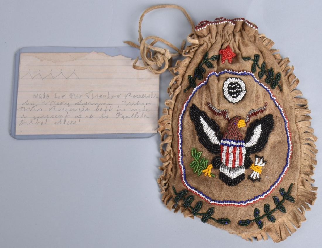 ROOSEVELT BEADED LEATHER POUCH W/ PRESDENTIAL SEAL: 9" well made with fine bead work. Comes with pencil note that states "made for Theodore Roosevelt by Mary Sarmms. Whe Mr. Roosevelt left he made a present of it to Ogadluda tribal elders". Light wear.