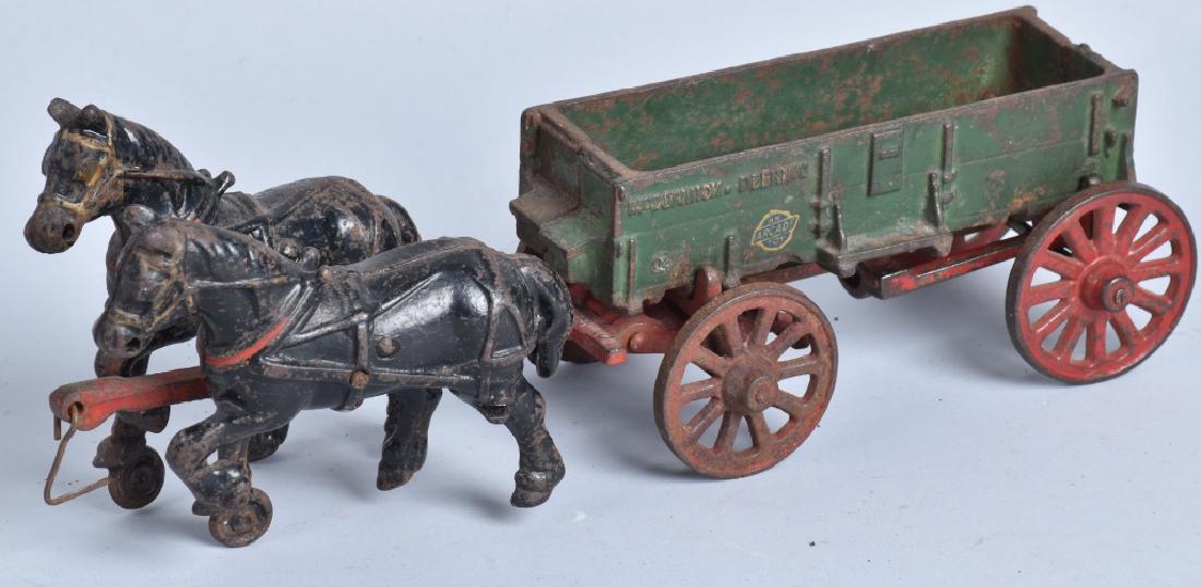 ARCADE CAST IRON McCORMICK DEERING WAGON (1 of 3)