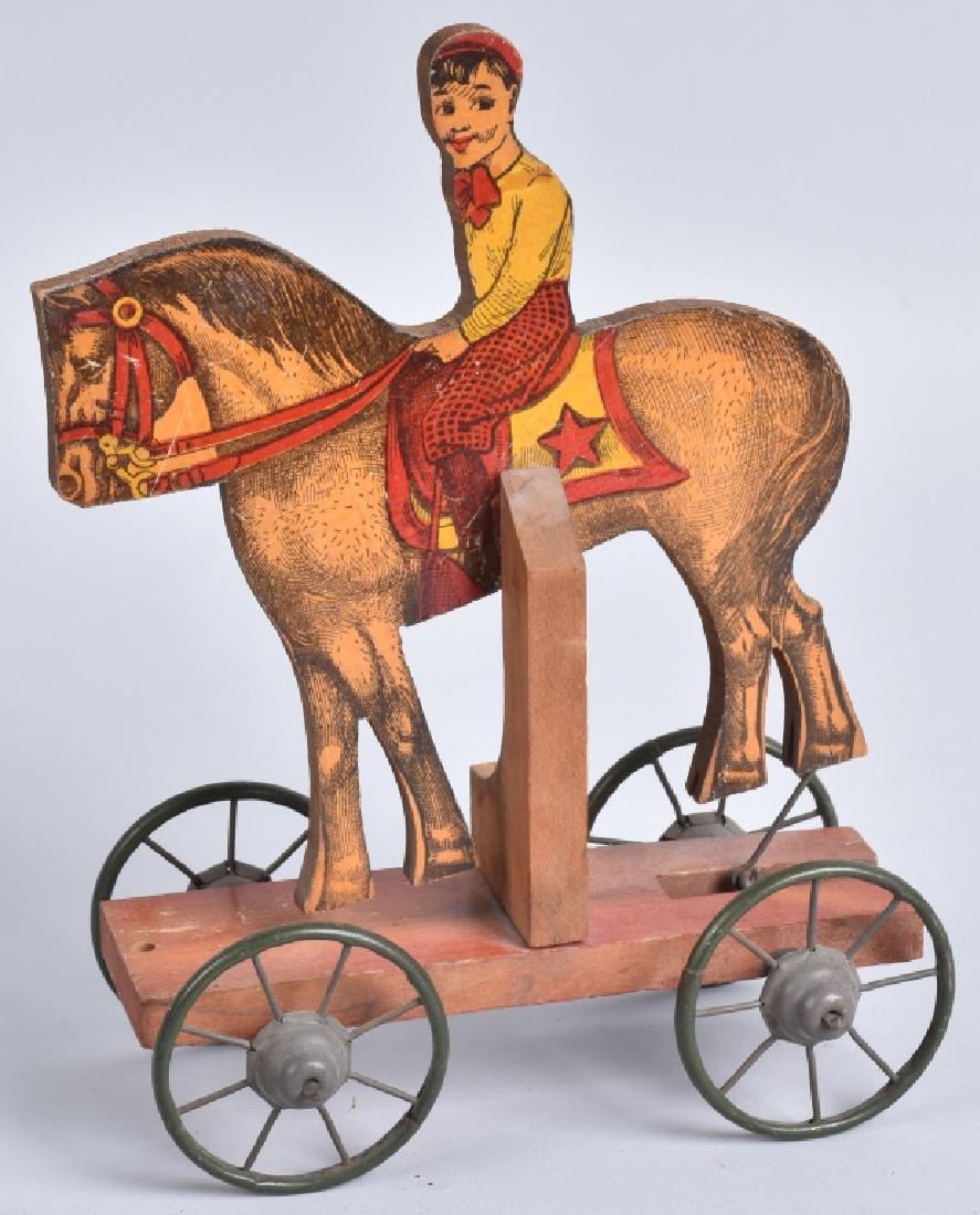 EARLY BOY on HORSE ARTICULATED PULL TOY (1 of 3)