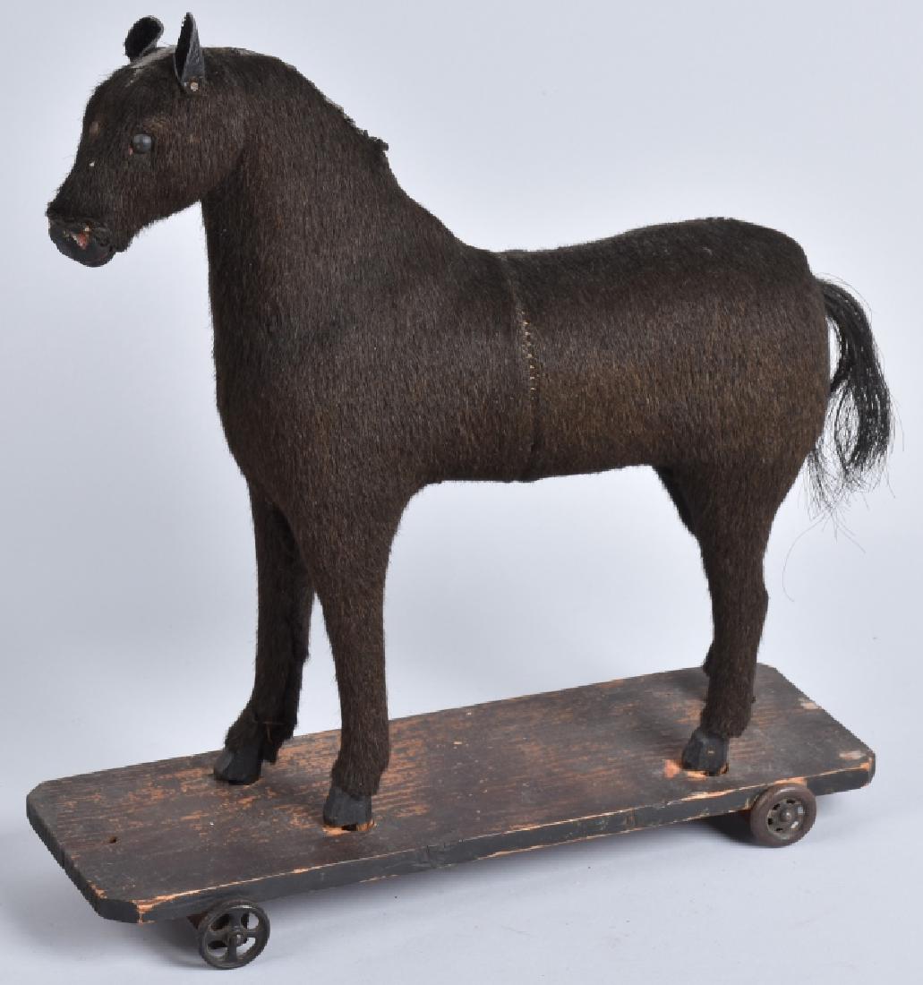 VINTAGE HIDE COVERED HORSE on PLATFORM (1 of 5)