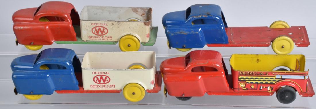 4- WYANDOTTE TRUCKS: Lot includes Fire Truck, 2 Tow Trucks, and More. Some missing parts. 11" Very Good