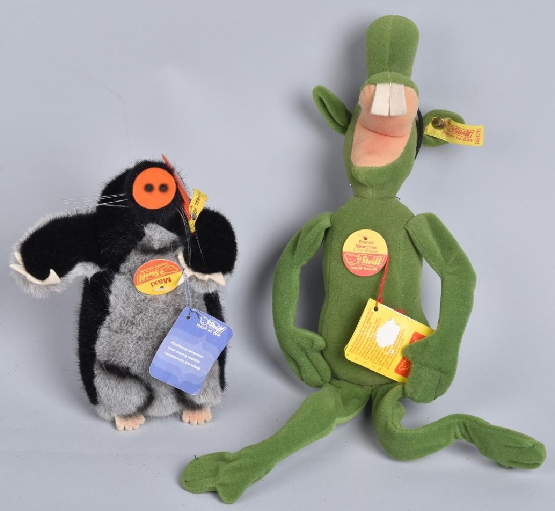 STEIFF GRUNES MANNCHEN & MAXI MOLE: Nice pair of original Steiff. Includes Grunes Mannchen The Little Green Man and Maxi the Mole with shovel. Both with buttons and tags. Largest measures 15" Excellent