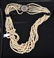 7 STRAND PEARL NECKLACE W/ 14KT GOLD CLASP