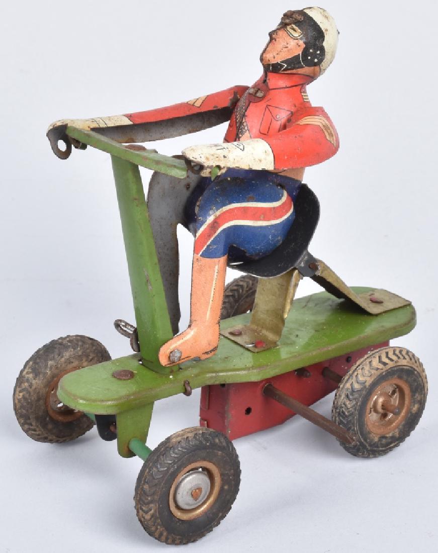 GERMAN TIN WINDUP BOY ON GO CART (1 of 4)