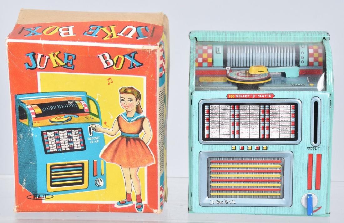 HAJI TIN WINDUP JUKE BOX BANK w/ BOX (1 of 5)