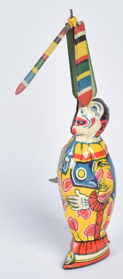 CHEIN TIN WINDUP CLOWN w/ WHIRLY GIG (1 of 3)