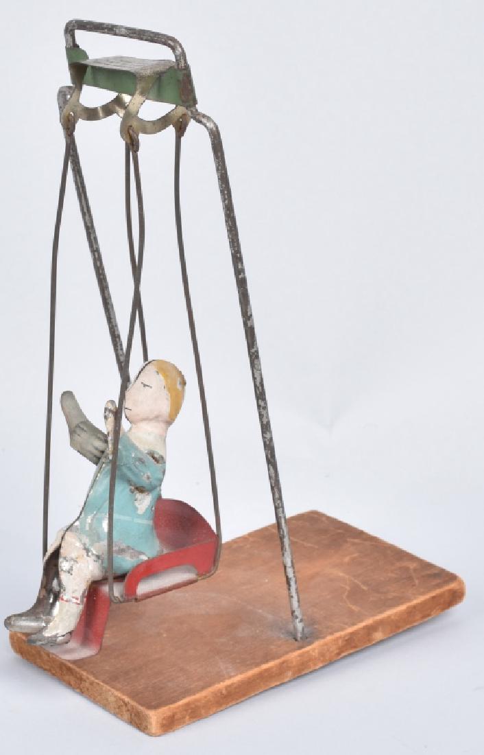 GIBBS GIRL ON SWING: All original with nice paint. 8" Very Good