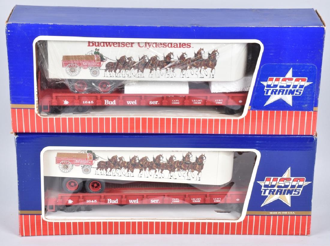 2 USA TRAINS T-1763 BUDWEISER CLYDESDALE CARS MIB: Pair of G Scale Budweiser Clydesdale Piggy-Back Flat Cars. With Boxes. Excellent