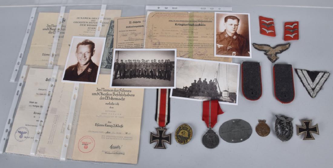 WW2 NAZI GERMAN IDENTIFIED GROUPING: WW2 Nazi German identified grouping. Outstanding untouched grouping of Medals - with award documents, insignia, dogtag, miscellaneous ephemera, and copies of photographs of Josef Wenger, senior NCO in