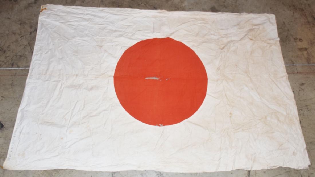 WW2 JAPANESE FLAG from LIGHT CRUISER NAKA: Measures about 96" by 66", and was a souvenir from the Naka a light cruiser and the Admirals flag ship. The flag is dated Dec 11, 1942. It was deemed uusable and brough home by a Japanese Naval Office