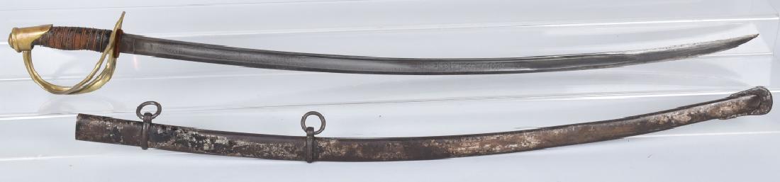 CIVIL WAR MODEL 1860 CAVALRY SWORD: Civil War M1860 Cavalry saber. About 40" long with 34" blade. Unmarked, European made. Traces of etching on the blade. Leather wrap is about 50% intact, still retains twisted brass wire. Very Good
