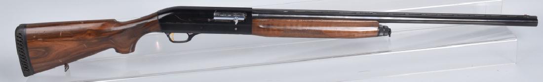 BENELLI SUPER 90 12 GA SEMI AUTOMATIC SHOTGUN: SN M224784 Benelli Model Super 90 12 gauge Semi Automatic Shotgun. Made in Italy. 28" Barrel with Clean Bore. Vented Rib. Action works. Stock some some wear. Very Good*