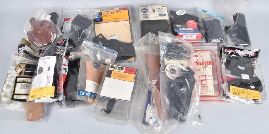 20-HANDGUN HOLSTERS LOT: The lot includes 5 Safariland holsters, 3 Don Hume Holster, 2 Rogers Holsters, 3 Uncle Mikes by Michaels of Oregon Holsters, 1 Allen, 1 Smith & Wesson, and much more. Excellent