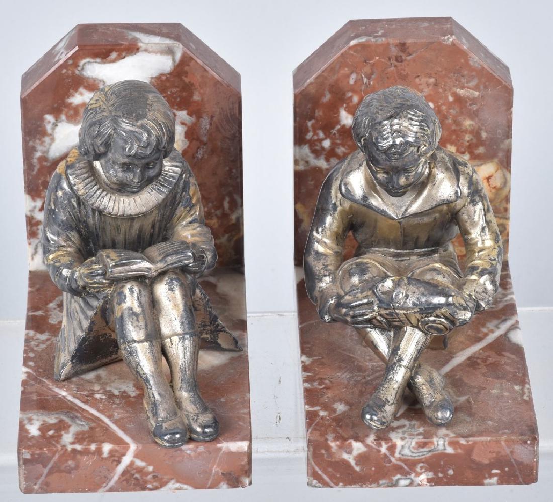 BOY WITH TOY CAR & GIRL WITH BOOK BOOKENDS: Cast metal Boy with toy car and Girl reading book on marble bases Bookends. Nice details. Have some wear to finish. 5" Very Good