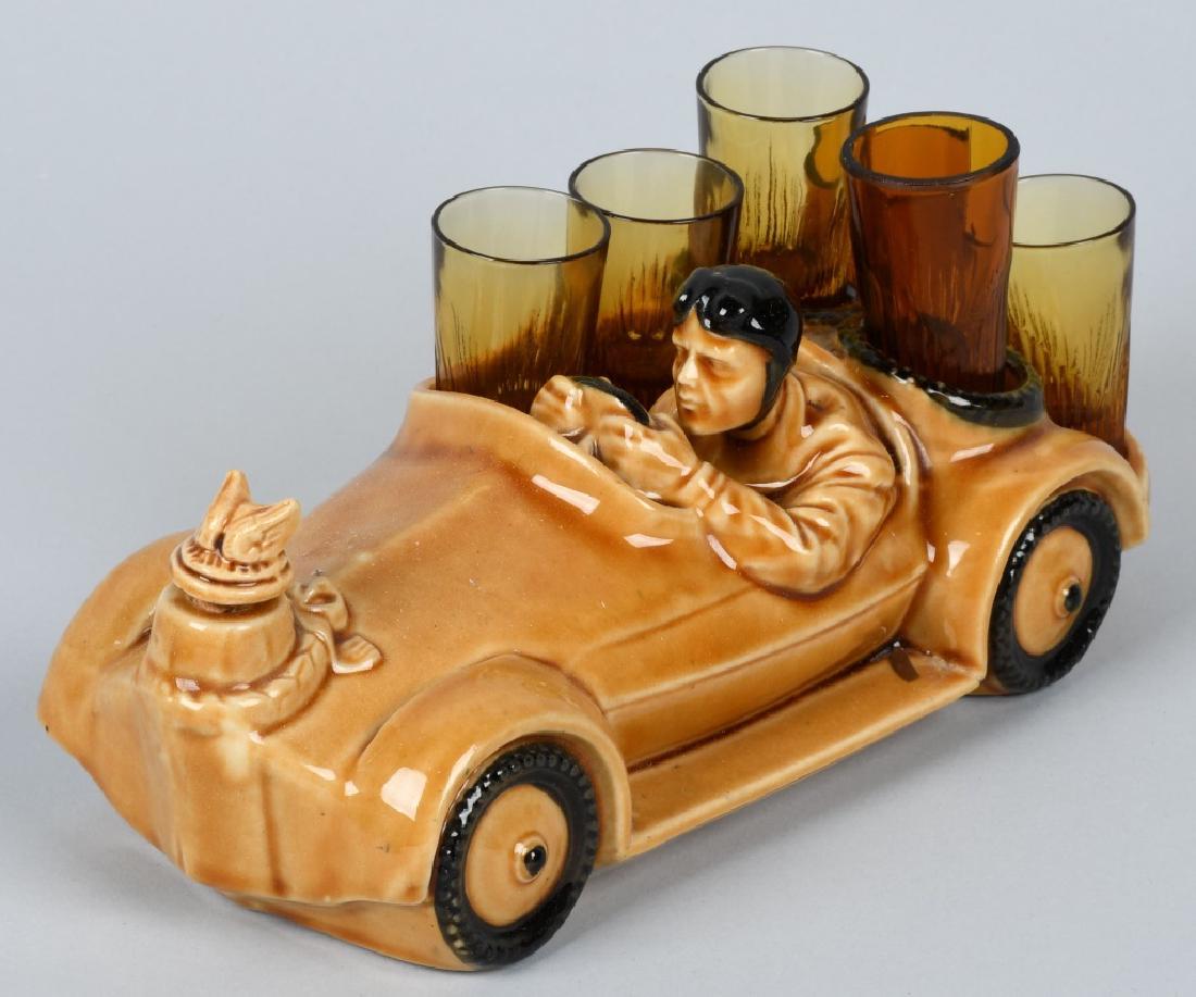 VINTAGE RACE CAR DECANTER w/ SHOT GLASSES: Excellent looking Race Car decanter with 6 shot glasses. Great design. 11" Excellent