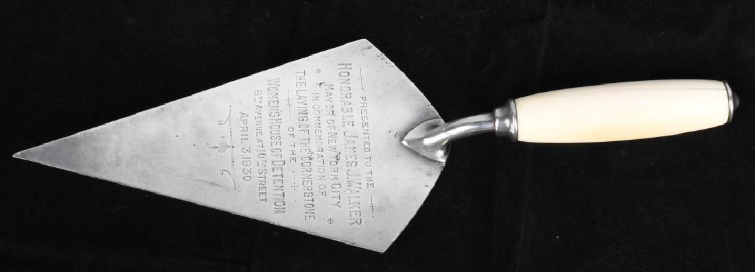 1930 NY MAYOR JAMES WALKER PRESENTATION TROWEL: Presentation Trowel given to New York City Mayor James Walker in 1930. Given the trowel for laying the cornerstone of the Woman's House of Detention. Silver plated trowel with bone handle. 12"