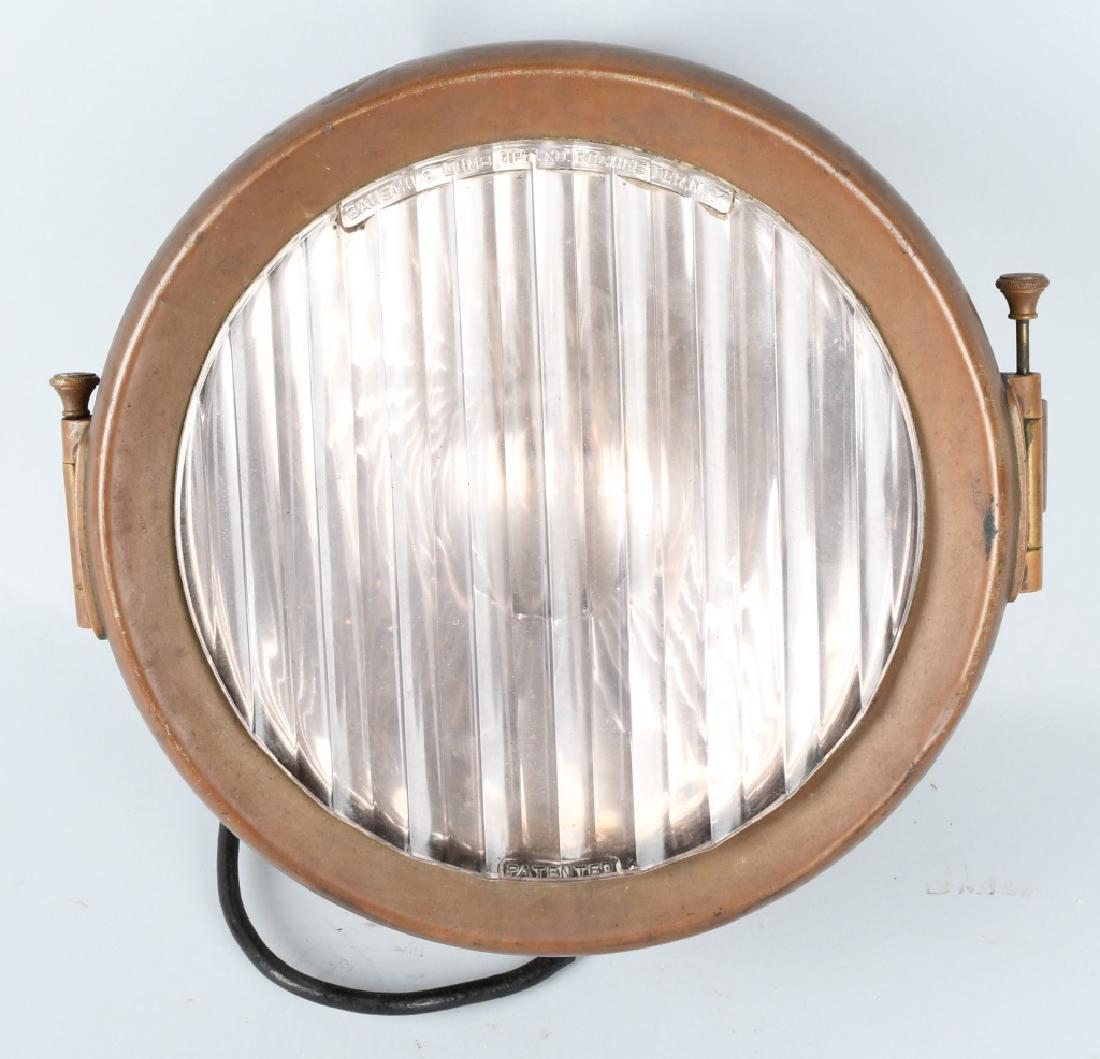 BAUSCH & LOMB BRASS SPOT LIGHT: Original brass Bausch & Lomb brass spotlight. All original with some cord. 14" Very Good