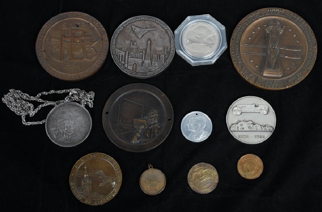 LOT OF MEDALLIONS & TOKENS: Includes Thompson Aircraft Medallion, Concors First Flight Medallion, Hackney Bros Body Medallion, Circuit De Chimay Medallion, and More. Plus Pontiac Token, US Airforce Token, and More.