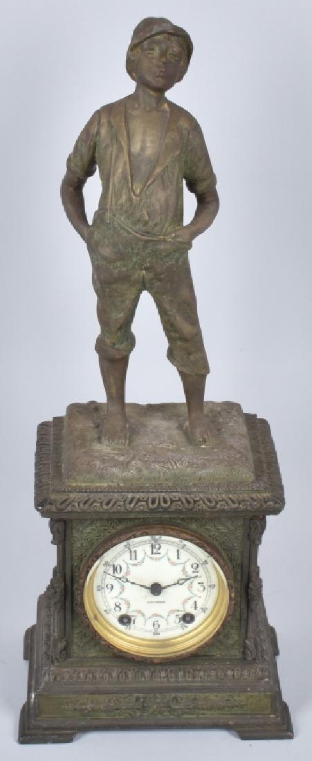 SETH THOMAS WHISTLING BOY CAST METAL CLOCK: About 22" high, nice cast details, appears to be spelter. Missing pendulum so untested. Includes key and did wind fine. Very Good