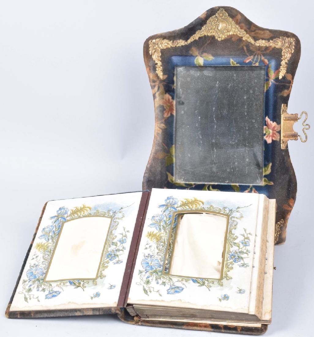 VICTORIAN CONVERTIBLE MUSICAL PHOTO ALBUM: About 13" by 10", converts into a table top mirror. Music box worked when it was tested. Very Good