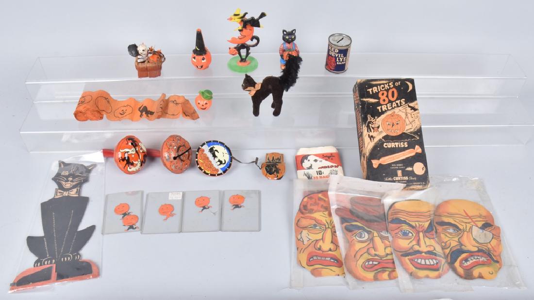 VINTAGE HALLOWEEN LOT: Great vintage lot with tin noisemakers, a Steiff black cat, toys, decorations and more. Condition varies. Most Very Good