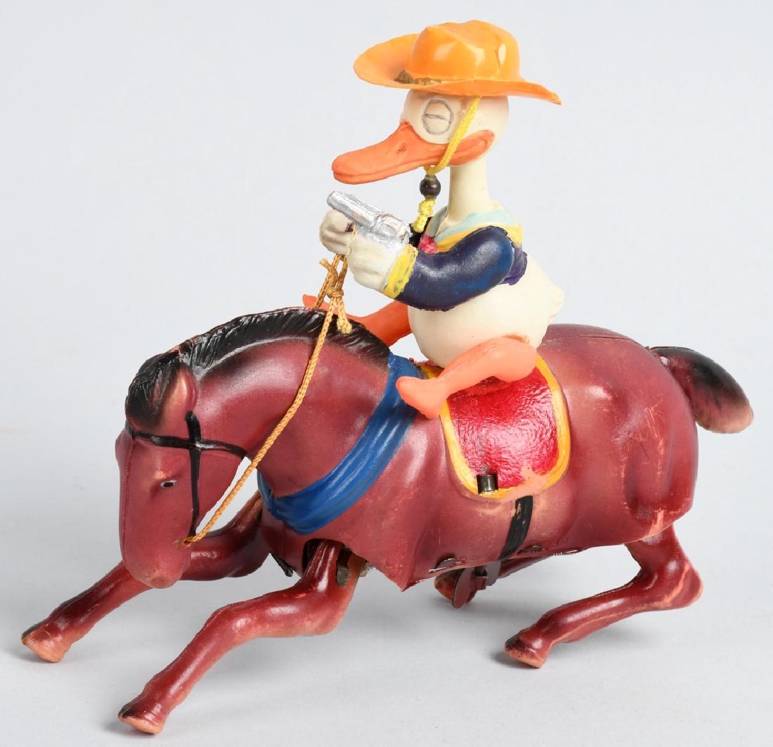 JAPAN Celluloid Windup DONALD DUCK RIDING BRONCO (1 of 5)