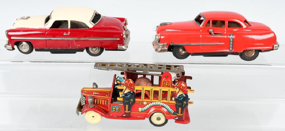 3-JAPAN TIN TOYS, FORD, CADILLAC & FIRE TRUCK (1 of 7)