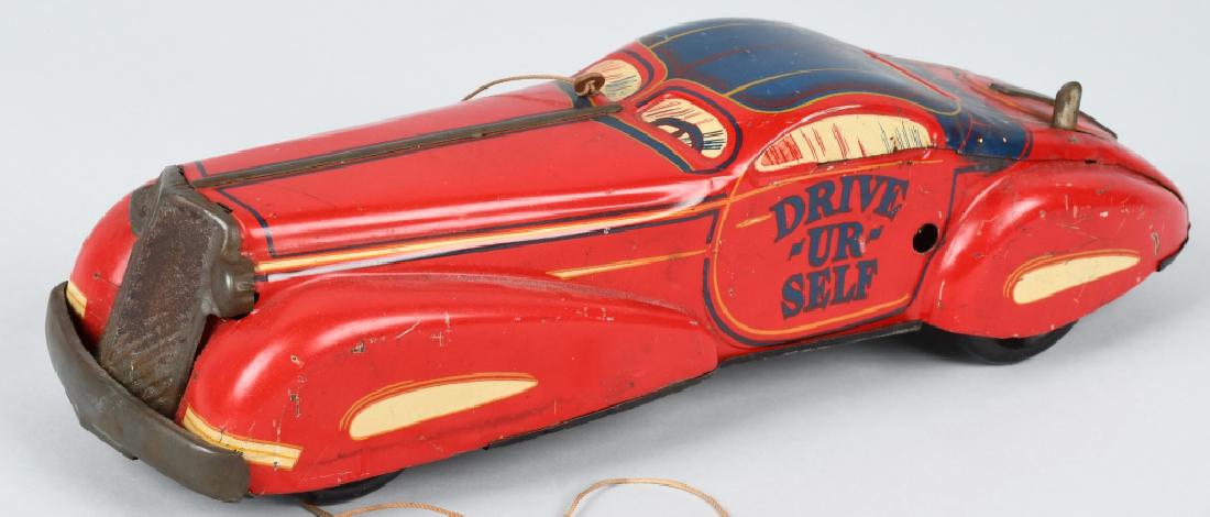 MARX Tin Winup DRIVE UR SELF STREAMLINE CAR: All original with nice colors. Windup not working. 14" Very Good-Excellent