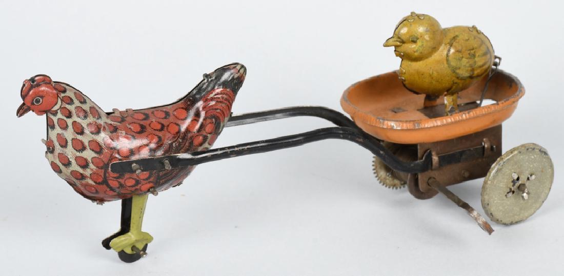 STRAUSS Tin Windup CHICKEN PULLING CHICK (1 of 4)