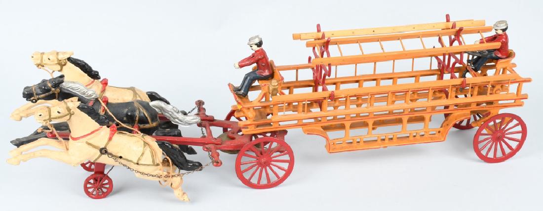 SEARS OVERSIZE CAST IRON HORSE DRAWN FIRE WAGON: 32" with 11" horses. This is a wonderful and impressive centennial piece made by Sears and Roebuck to commemorate 100 years in business. Very well made and detailed. Rear fireman has a glue repair on 