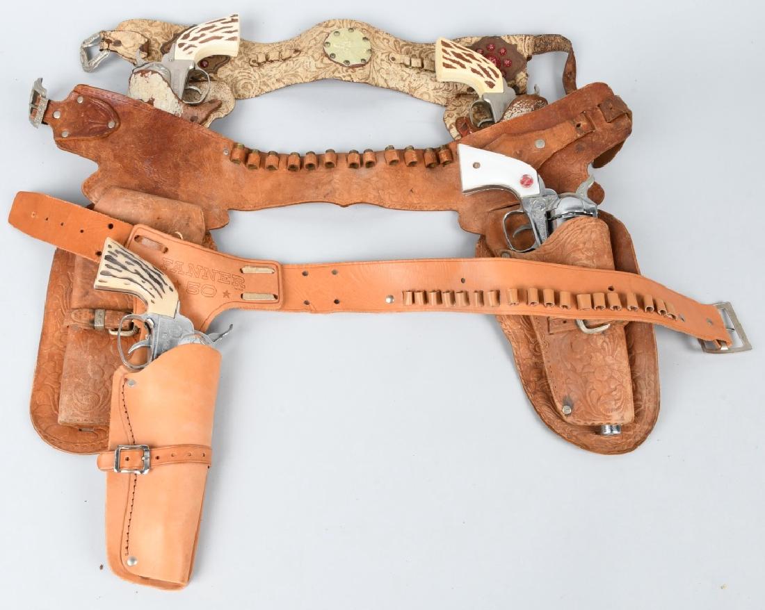 VINTAGE CAP GUN LOT, NICHOLS, MATTEL FANNER & MORE: Lot includes Nichols Stallion in working condition, a Fanner 50 in working condition and a pair of Halco pistols in working condition. Includes holsters. Condition varies. Most Very Good
