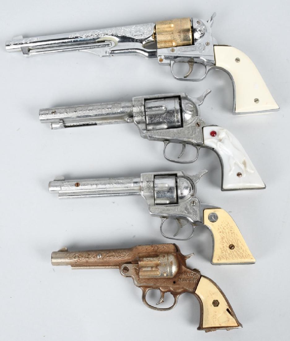 LOT OF 4 VINTAGE CAP GUNS: Includes Colt 45, Stallion 45, Stallion 38, and Peace Maker. All with some wear. Very Good-Excellent