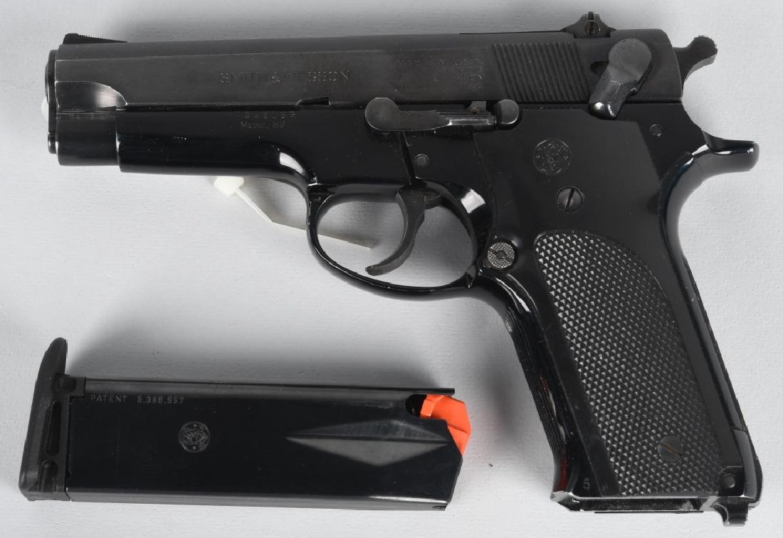 SMITH & WESSON MODEL 59, 9mm PISTOL: SN A358186, 4" barrel with excellent bore. 95% finish. Checkered plastic grips have handling marks. Action needs attention. When cocked with the safety on the hammer drops when the safety is moved to 
