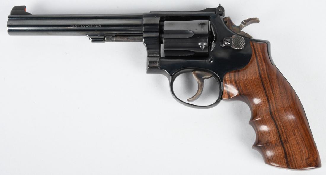 SMITH & WESSON 14-3, .38 SPECIAL REVOLVER: SN K852129, 6" barrel with excellent bore. Pistol is fitted with target hammer and trigger both retaining case colors. 98% blue finish with excellent custom wood grips. Crisp action, cocks and locks u