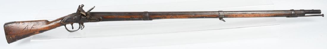 HARPERS FERRY MODEL 1795, .69 MUSKET, 1810: Harpers Ferry .69 caliber musket with 45" barrel. Full length stock appears original. Has overall age wear and some cracks. Lock has been re-converted to flint. The flash pan is a replacement. The fri
