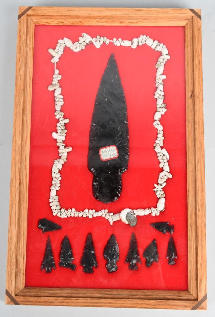 OBSIDIAN SPEAR POINT GROUPING, LAKE CO, OREGON: Spear point is about 5 3/4". Also included are 9 small projectile points, a shell necklace. Very Good-Excellent